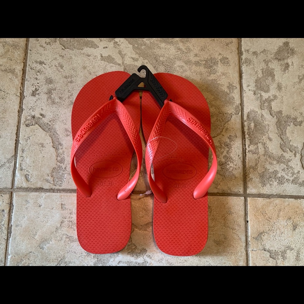 Havaiana’s flip-flops in size 39-40. Bright red. NWT